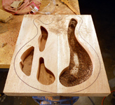 The Carved Back Rosewood Neck Guitar